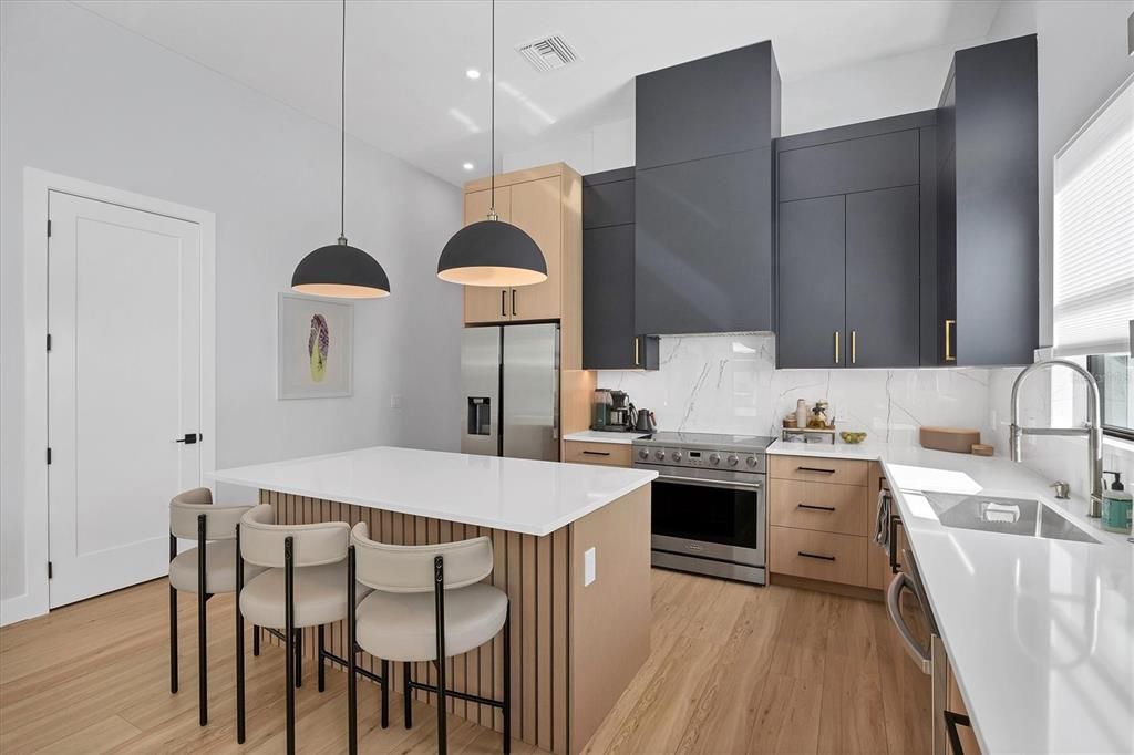 Interior, Kitchen, Pendant Lights, Recessed Lighting, Stainless Steel Appliances, Wood Texture Flooring