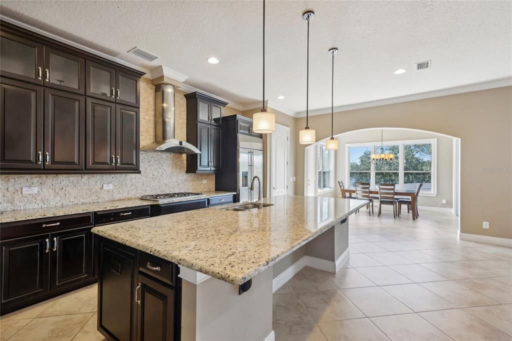 Chandelier, Dining room, Interior, Kitchen, Pendant Lights, Recessed Lighting, Stainless Steel Appliances