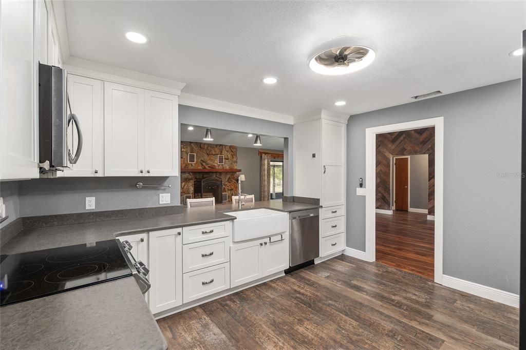 Fireplace, Interior, Kitchen, Recessed Lighting, Wood Texture Flooring