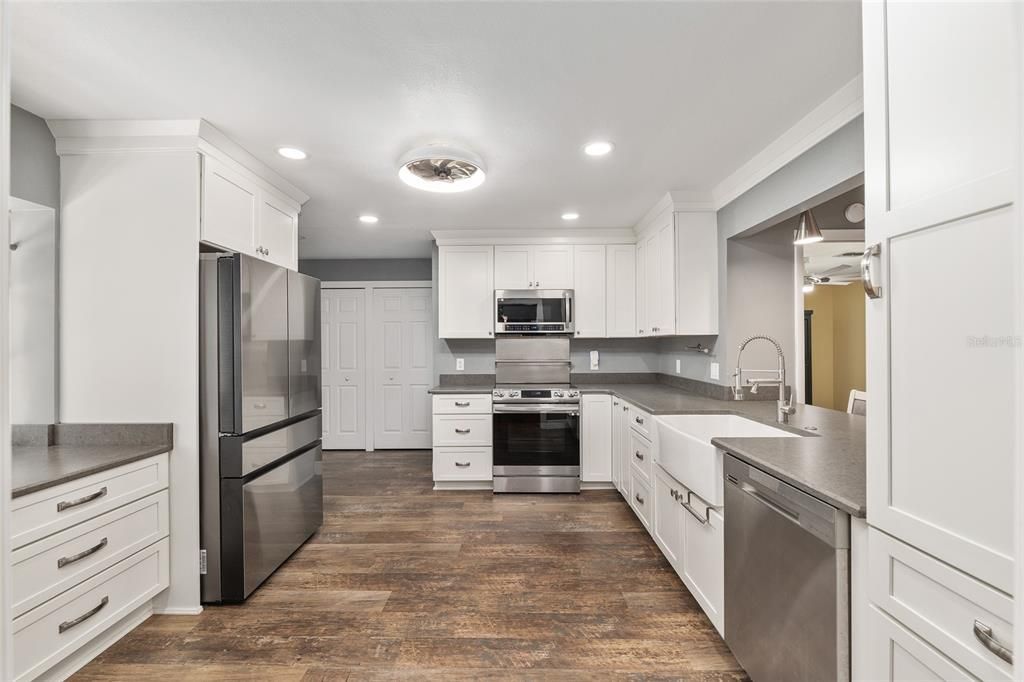 Interior, Kitchen, Recessed Lighting, Stainless Steel Appliances, Wood Texture Flooring