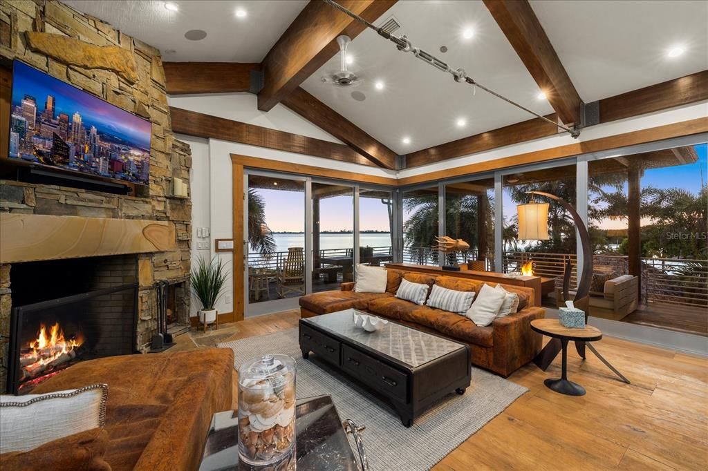 Fireplace, Interior, Living room, Recessed Lighting, Stone Walls, Wooden Beams, Wood Texture Flooring