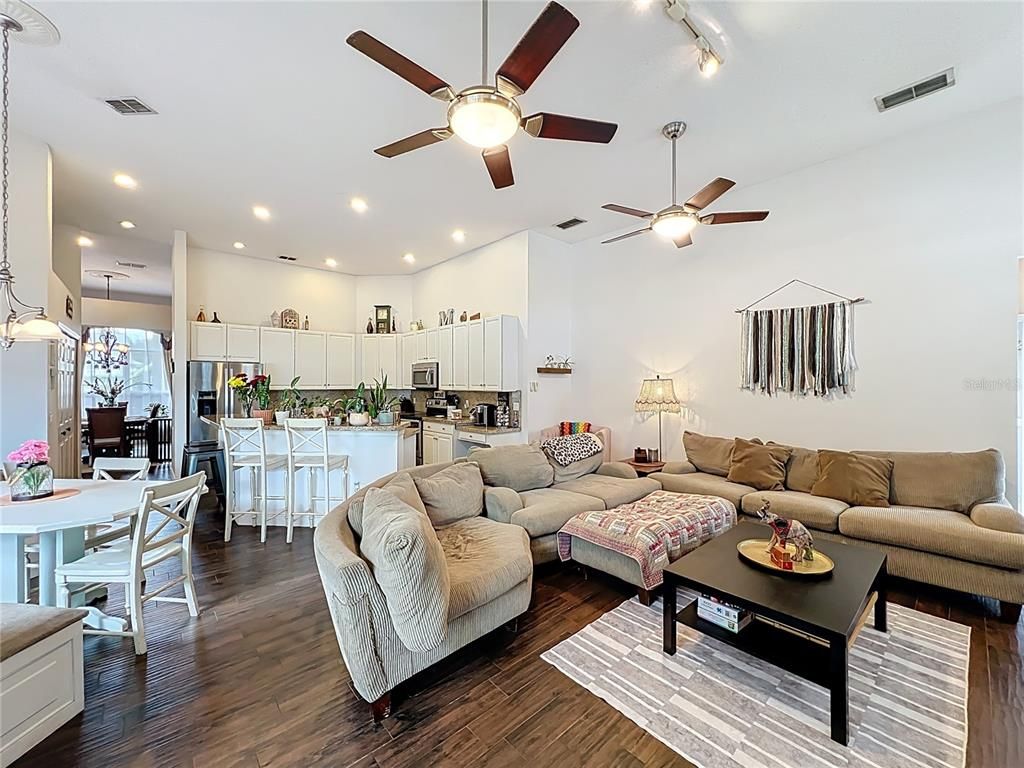 Dining room, Interior, Kitchen, Living room, Recessed Lighting, Stainless Steel Appliances, Wood Texture Flooring