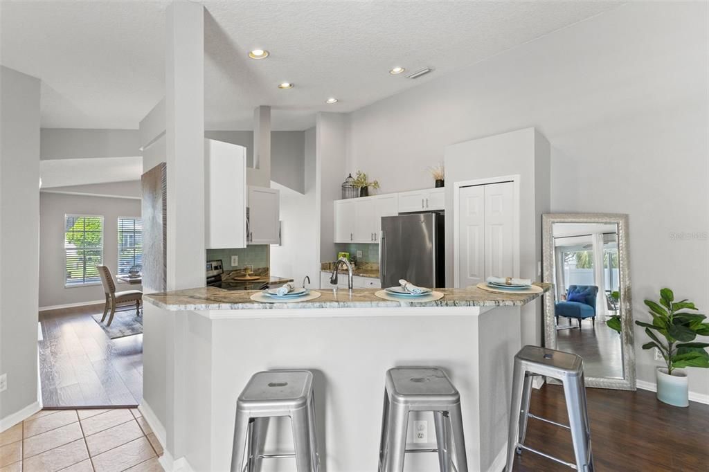 Dining room, Interior, Kitchen, Recessed Lighting, Stainless Steel Appliances, Wood Texture Flooring