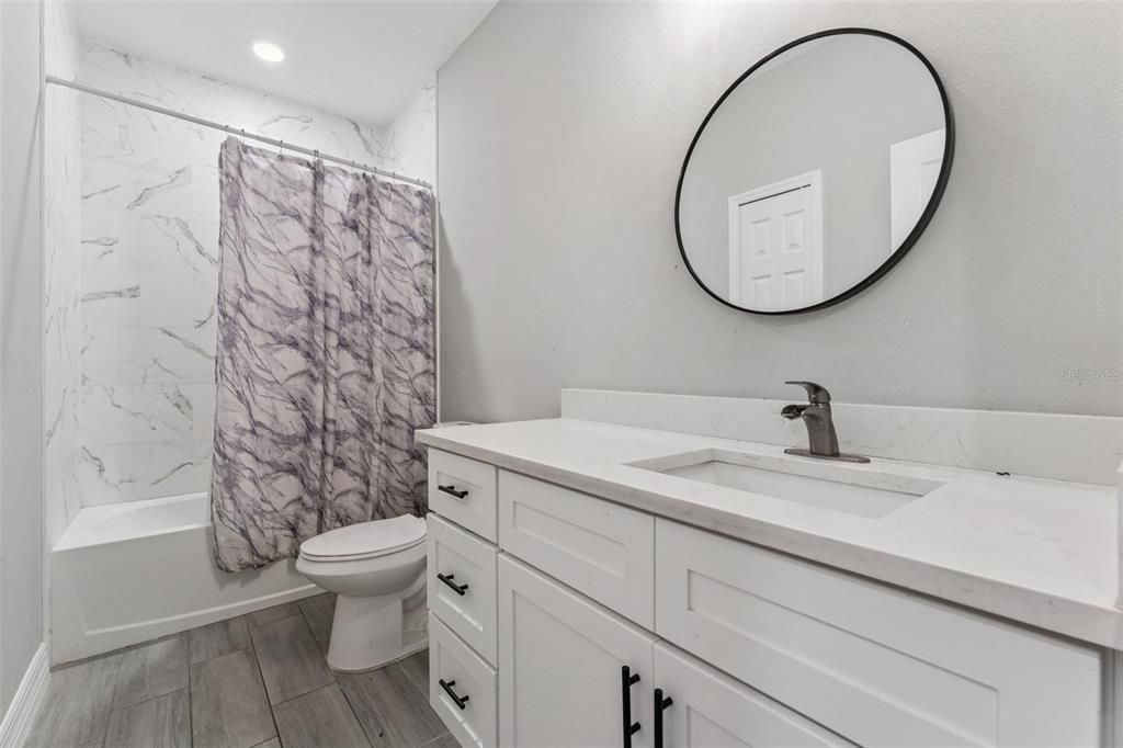 Bathroom, Interior, Marble Walls, Recessed Lighting, Wood Texture Flooring