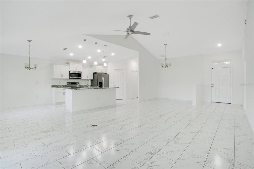 Chandelier, Empty room, Interior, Kitchen, Marble, Pendant Lights, Recessed Lighting, Stainless Steel Appliances