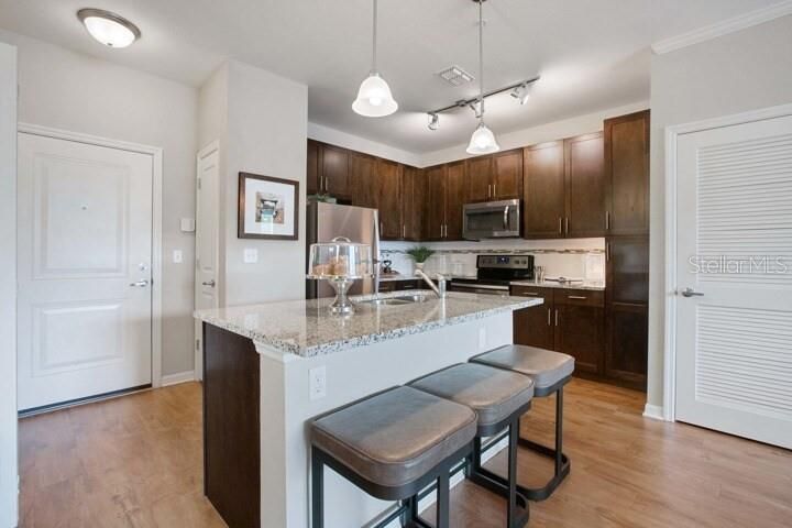 Interior, Kitchen, Pendant Lights, Stainless Steel Appliances, Wood Texture Flooring