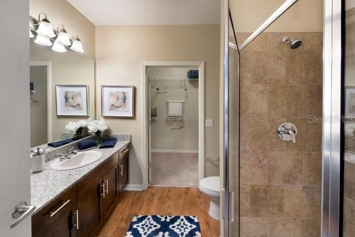 Bathroom, Dual Sink Vanities, Glass Shower, Interior, Wood Texture Flooring