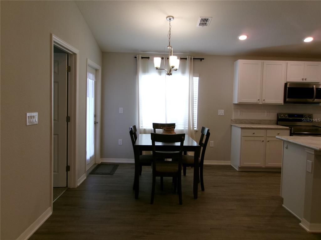 Chandelier, Dining room, Interior, Kitchen, Pendant Lights, Recessed Lighting, Wood Texture Flooring
