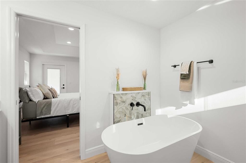 Bathroom, Bedroom, Free Standing Baths, Interior, Recessed Lighting, Wood Texture Flooring