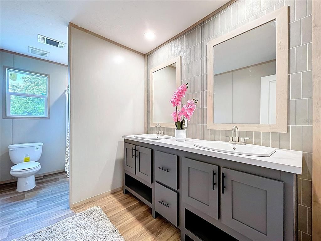Bathroom, Dual Sink Vanities, Interior, Recessed Lighting, Wood Texture Flooring