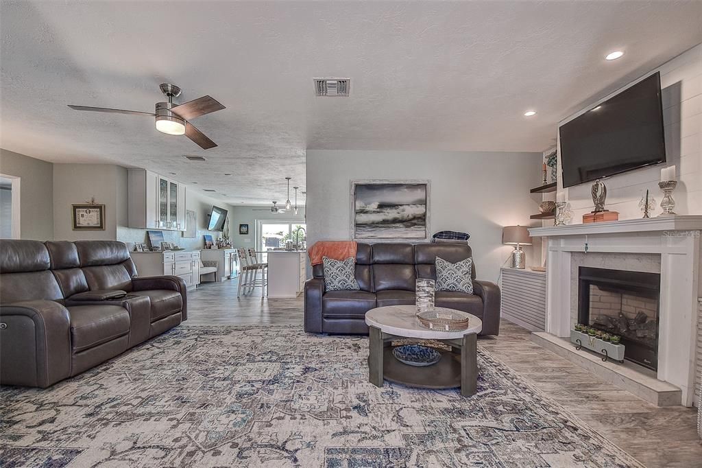 Dining room, Fireplace, Interior, Kitchen, Living room, Pendant Lights, Recessed Lighting, Wood Texture Flooring