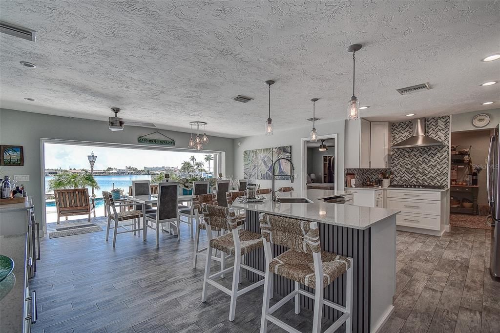 Dining room, Interior, Kitchen, Pendant Lights, Recessed Lighting, Water, Wood Texture Flooring