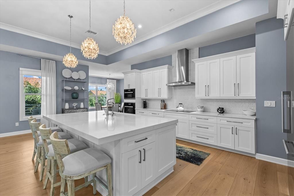 Chandelier, Interior, Kitchen, Pendant Lights, Recessed Lighting, Stainless Steel Appliances, Wood Texture Flooring