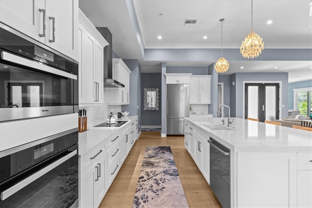 Chandelier, Interior, Kitchen, Pendant Lights, Recessed Lighting, Stainless Steel Appliances, Wood Texture Flooring