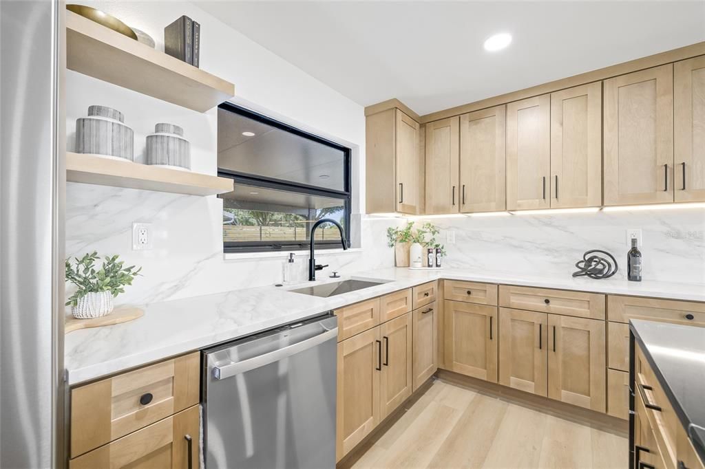 Interior, Kitchen, Marble Walls, Recessed Lighting, Stainless Steel Appliances, Wood Texture Flooring