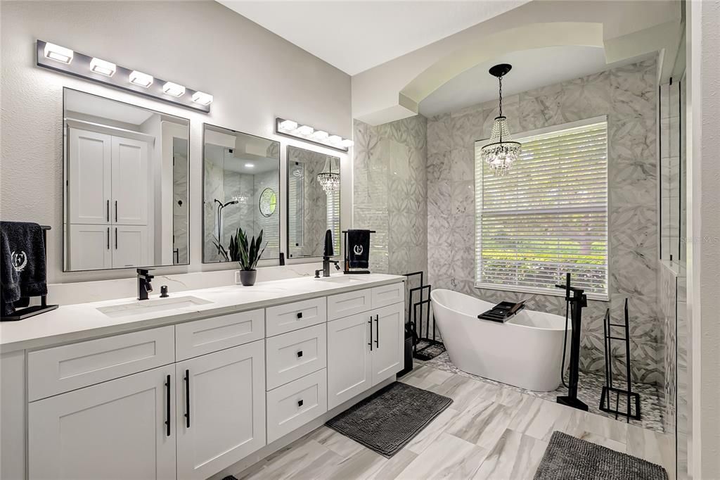 Bathroom, Dual Sink Vanities, Free Standing Baths, Glass Shower, Interior, Marble, Marble Walls, Pendant Lights