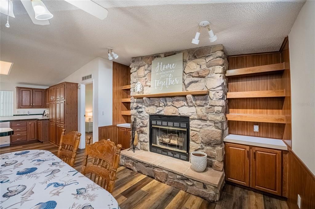 Dining room, Fireplace, Interior, Stone Walls, Wood Texture Flooring