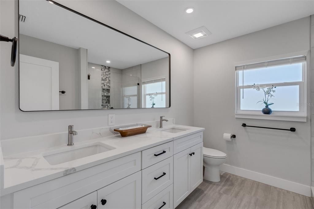 Bathroom, Dual Sink Vanities, Interior, Recessed Lighting, Wood Texture Flooring