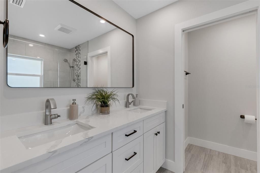 Bathroom, Dual Sink Vanities, Interior, Recessed Lighting, Wood Texture Flooring