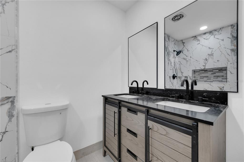 Bathroom, Dual Sink Vanities, Interior, Marble Walls, Recessed Lighting