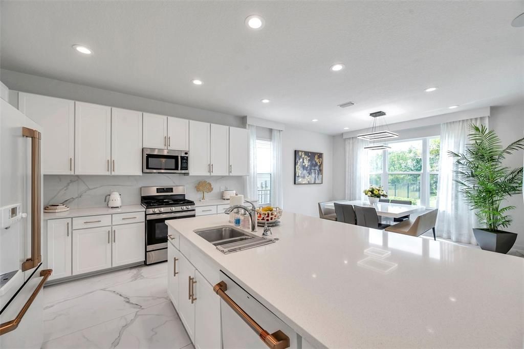 Dining room, Interior, Kitchen, Marble, Pendant Lights, Recessed Lighting, Stainless Steel Appliances