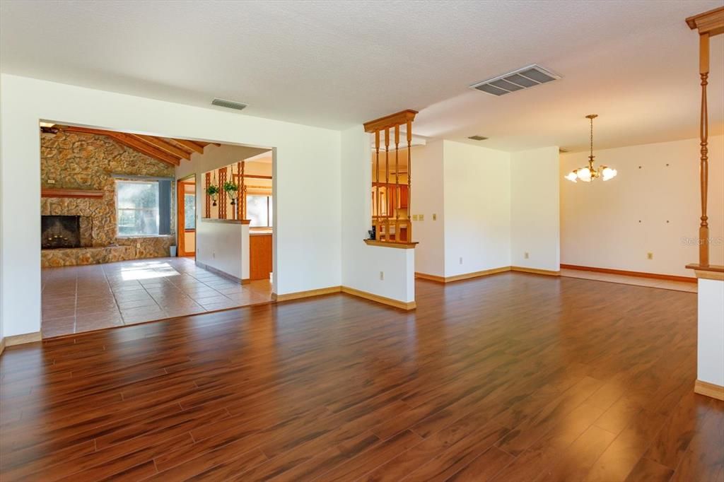 Chandelier, Empty room, Fireplace, Interior, Pendant Lights, Wood Texture Flooring