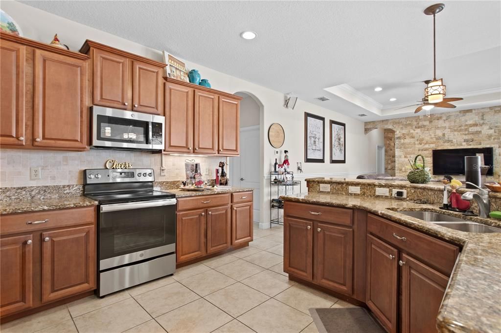 Interior, Kitchen, Recessed Lighting, Stainless Steel Appliances, Stone Walls