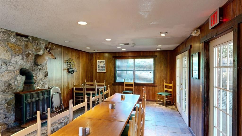Dining room, Fireplace, Interior, Recessed Lighting, Stone Walls, Wooden Walls
