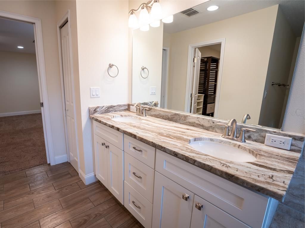 Bathroom, Dual Sink Vanities, Interior, Recessed Lighting, Wood Texture Flooring