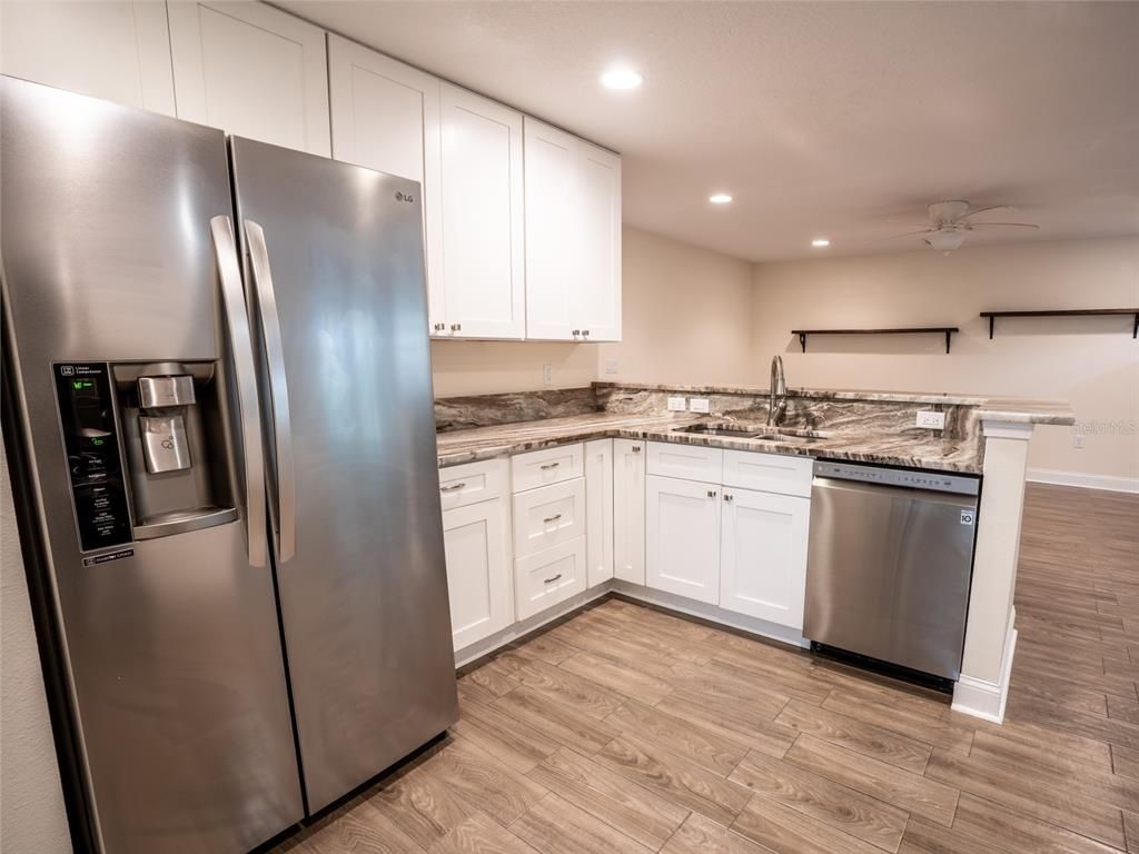Interior, Kitchen, Recessed Lighting, Stainless Steel Appliances, Wood Texture Flooring
