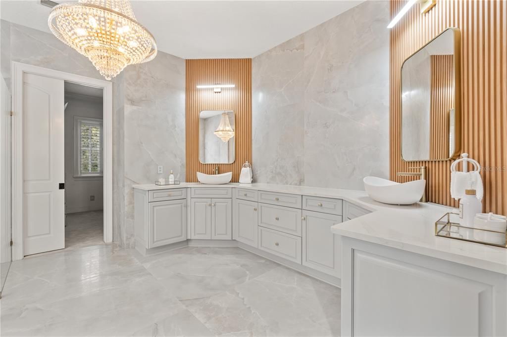 Bathroom, Chandelier, Dual Sink Vanities, Interior, Marble Walls