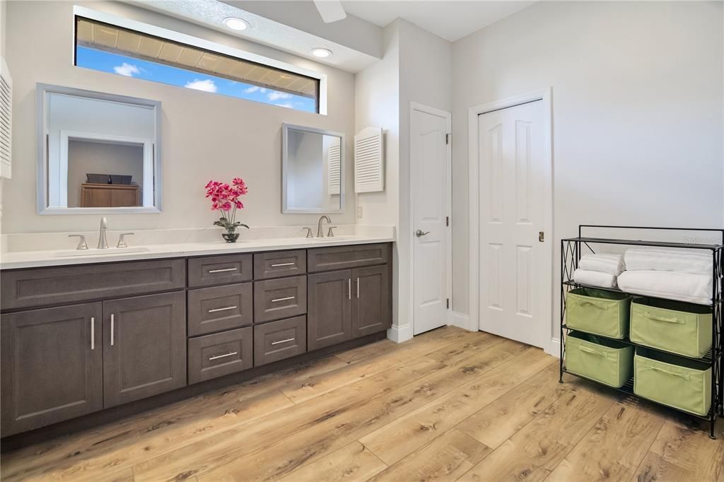 Bathroom, Dual Sink Vanities, Interior, Recessed Lighting, Wood Texture Flooring