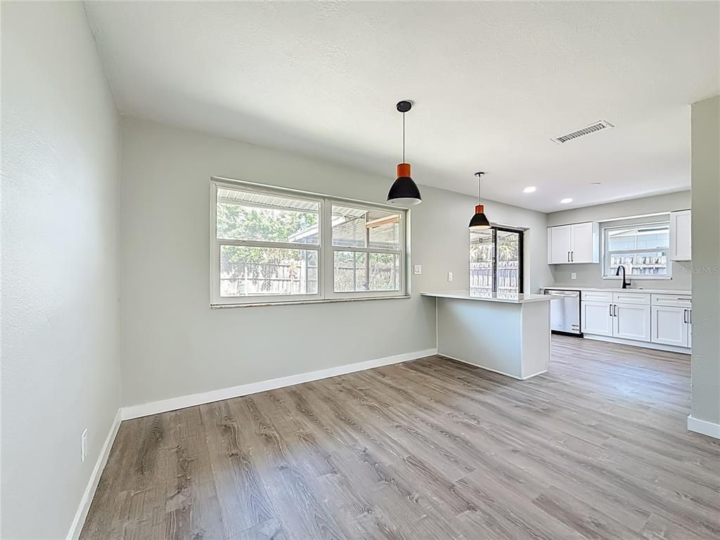 Empty room, Interior, Kitchen, Pendant Lights, Recessed Lighting, Wood Texture Flooring