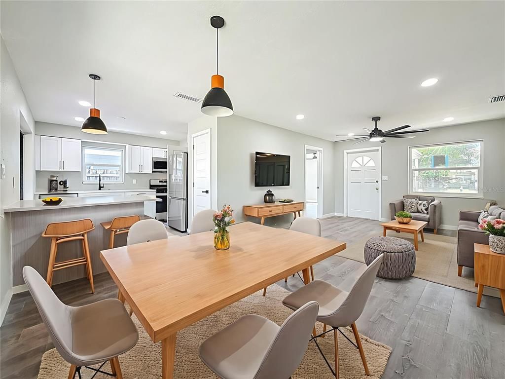 Dining room, Interior, Kitchen, Living room, Pendant Lights, Recessed Lighting, Stainless Steel Appliances, Wood Texture Flooring