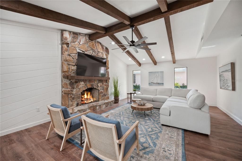 Fireplace, Interior, Living room, Recessed Lighting, Stone Walls, Wooden Beams, Wood Texture Flooring