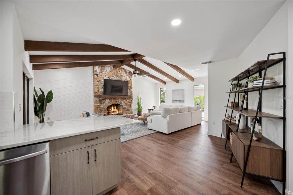 Fireplace, Interior, Living room, Recessed Lighting, Stone Walls, Wooden Beams, Wood Texture Flooring