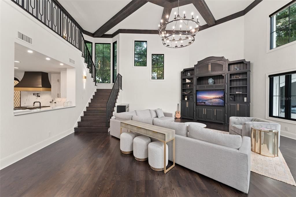 Chandelier, Interior, Living room, Pendant Lights, Recessed Lighting, Wooden Beams, Wood Texture Flooring