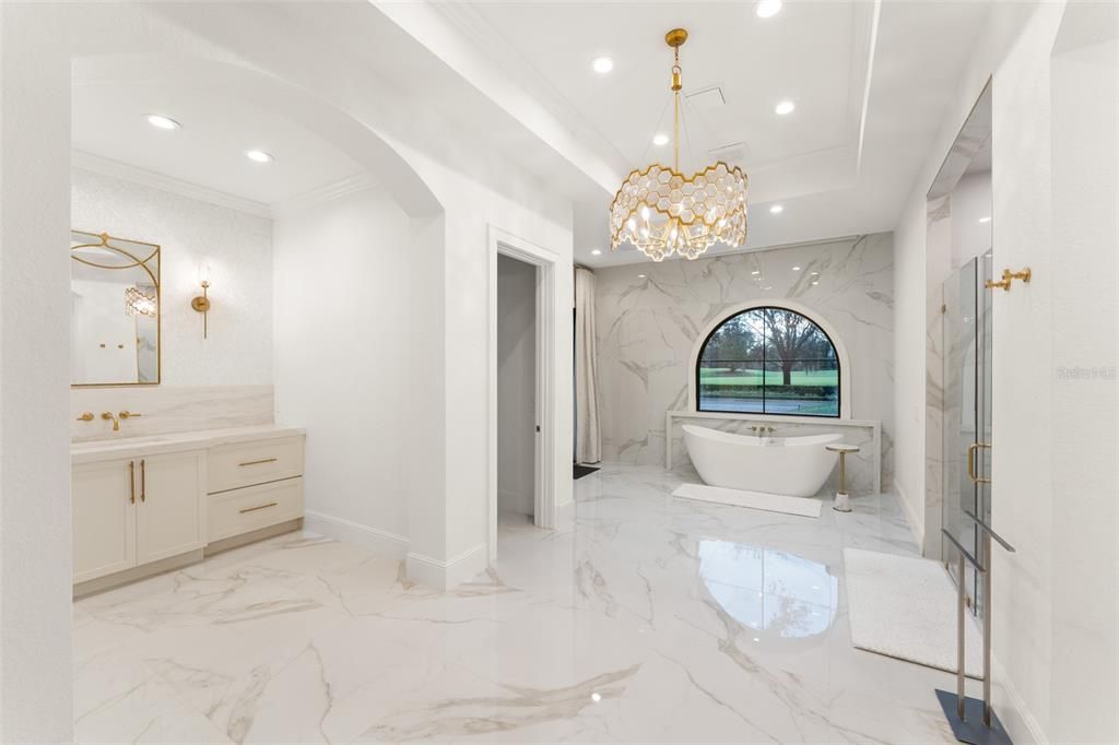 Bathroom, Chandelier, Free Standing Baths, Interior, Marble, Marble Walls, Pendant Lights, Recessed Lighting
