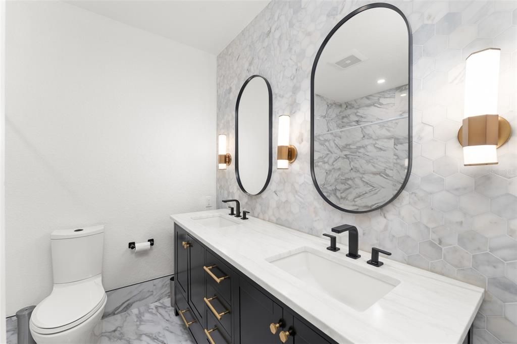 Bathroom, Dual Sink Vanities, Interior, Marble, Marble Walls, Recessed Lighting