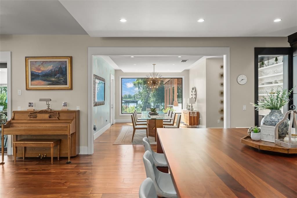Chandelier, Dining room, Interior, Piano, Recessed Lighting, Wood Texture Flooring
