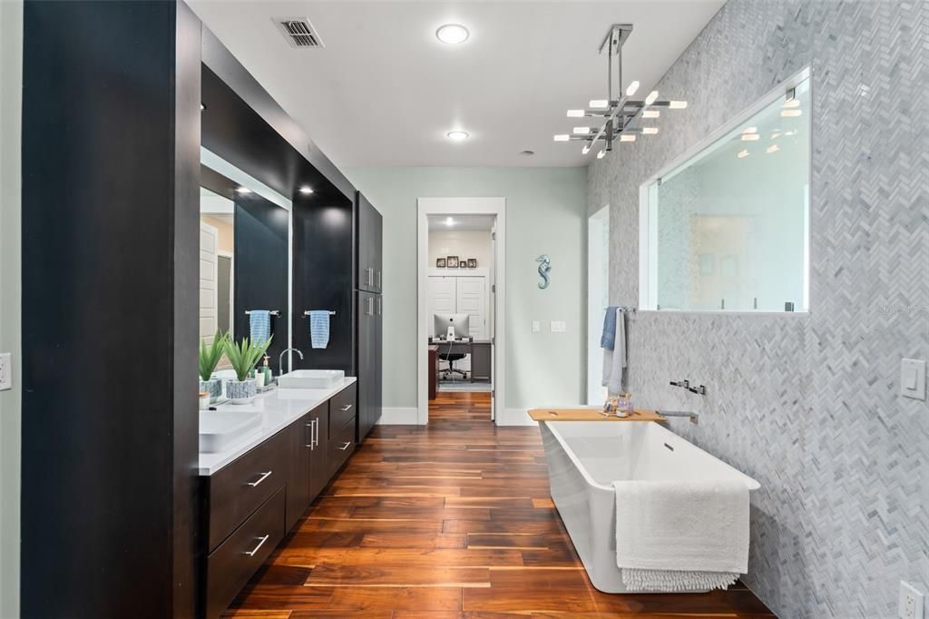 Bathroom, Dual Sink Vanities, Free Standing Baths, Interior, Pendant Lights, Recessed Lighting, Wood Texture Flooring