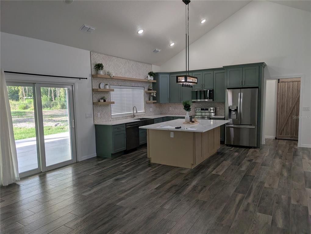 Interior, Kitchen, Pendant Lights, Recessed Lighting, Stainless Steel Appliances, Wood Texture Flooring