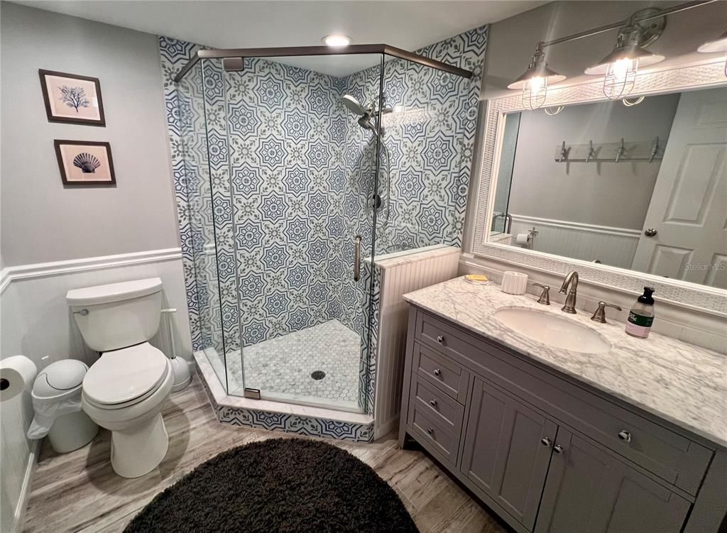 Bathroom, Glass Shower, Interior, Recessed Lighting, Wood Texture Flooring