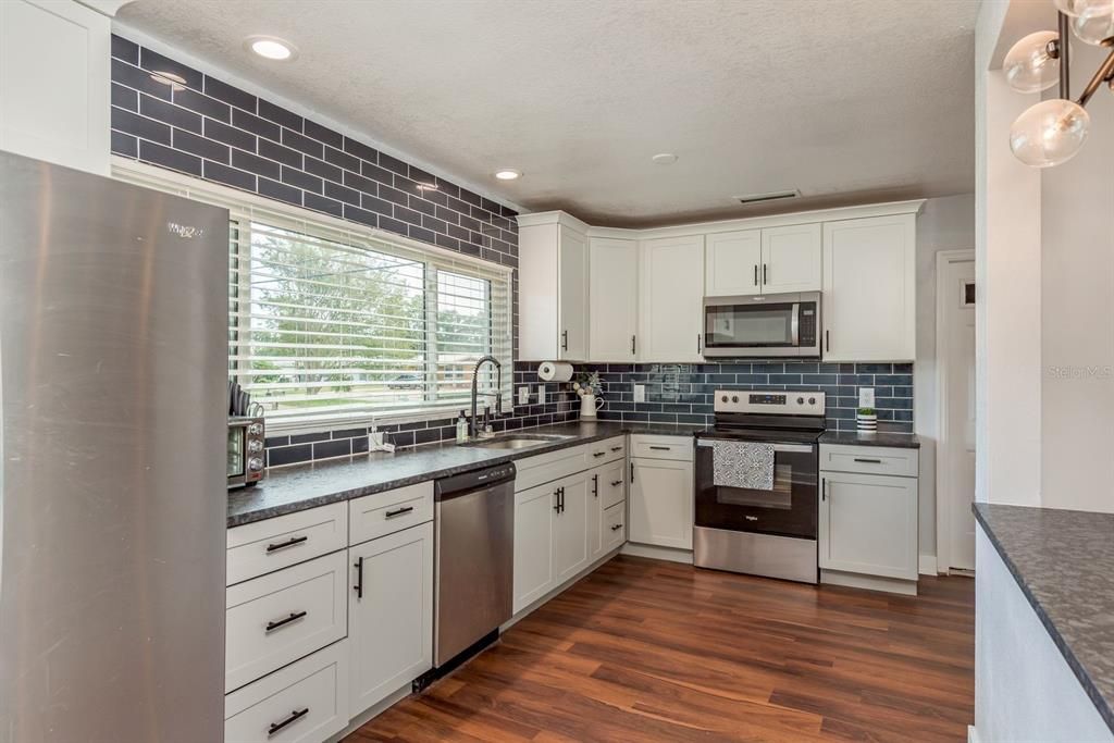 Interior, Kitchen, Recessed Lighting, Stainless Steel Appliances, Wood Texture Flooring