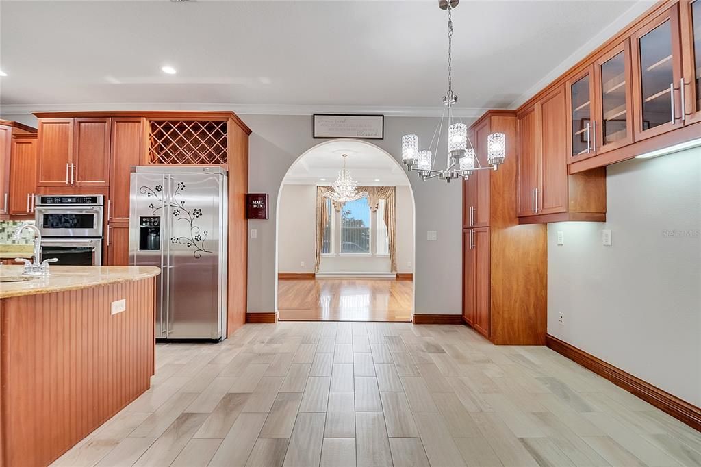 Chandelier, Interior, Kitchen, Recessed Lighting, Stainless Steel Appliances, Wood Texture Flooring