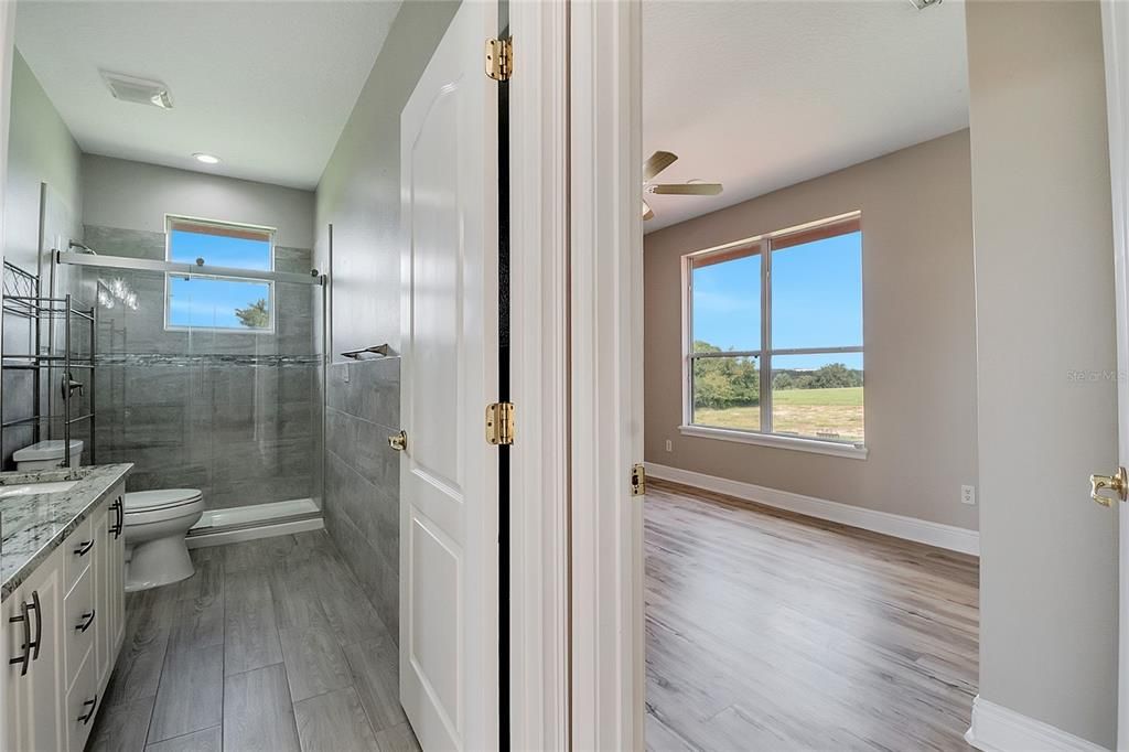 Bathroom, Glass Shower, Interior, Recessed Lighting, Wood Texture Flooring
