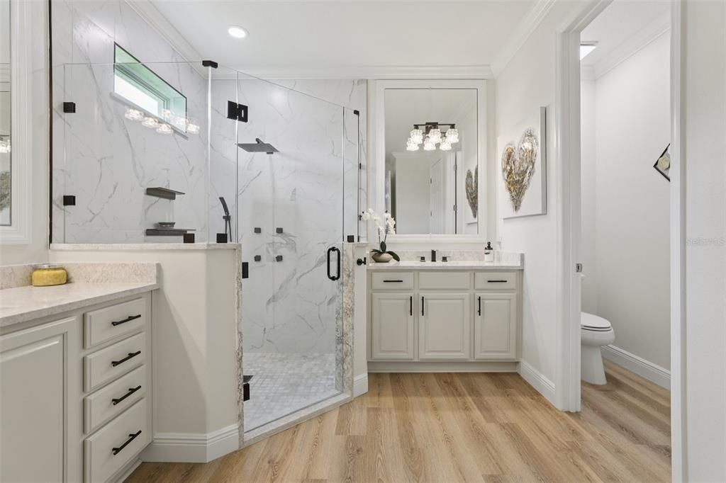 Bathroom, Glass Shower, Interior, Marble Walls, Recessed Lighting, Wood Texture Flooring