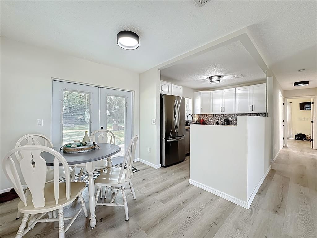 Dining room, Interior, Kitchen, Stainless Steel Appliances, Wood Texture Flooring