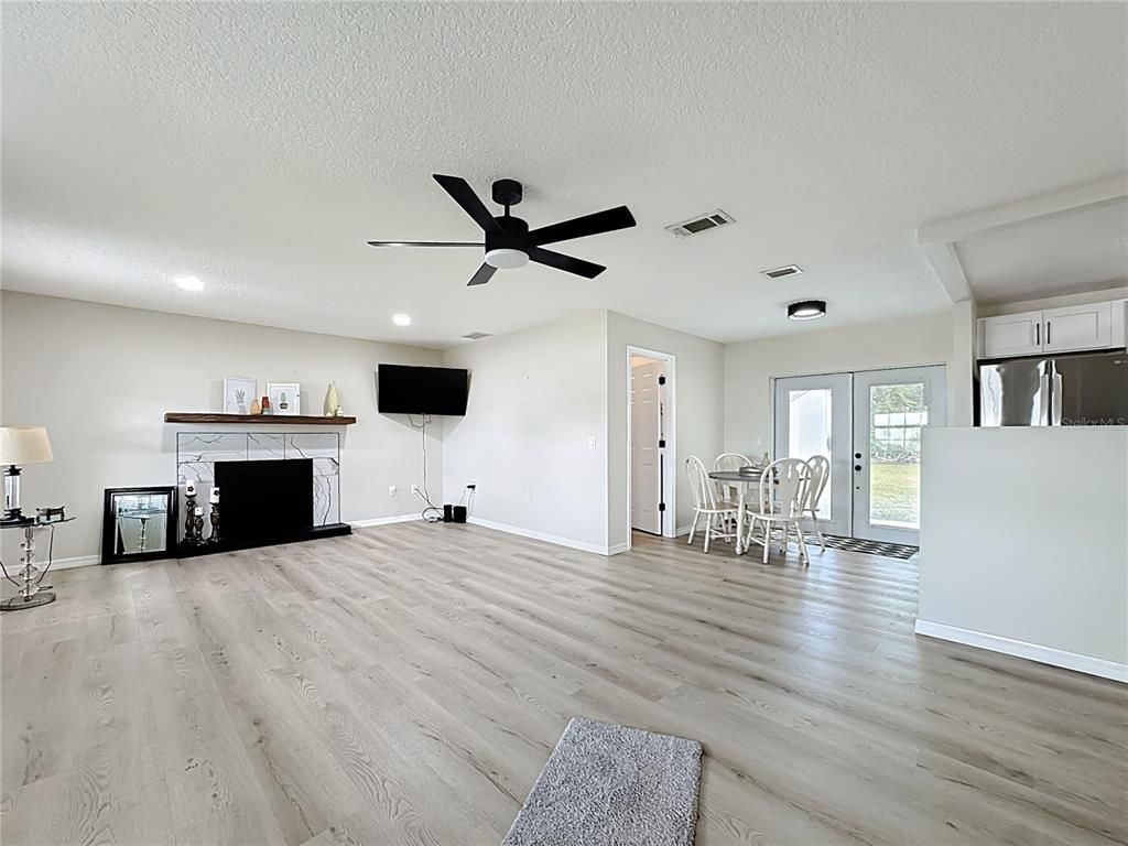 Empty room, Fireplace, Interior, Recessed Lighting, Wood Texture Flooring