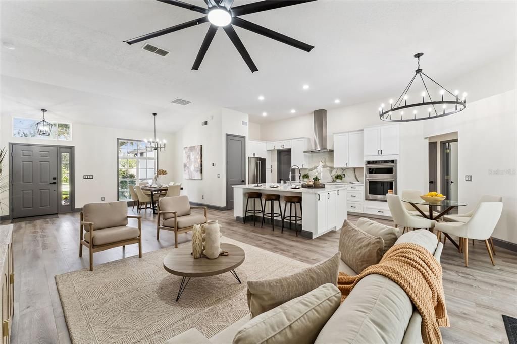 Chandelier, Dining room, Interior, Kitchen, Living room, Pendant Lights, Recessed Lighting, Stainless Steel Appliances, Wood Texture Flooring